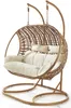 A double hanging chair with cushions on a white background. Produktbild-Vorschau