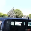 A dark-colored van with silver roof racks is parked outdoors, with trees and buildings in the background. Náhľad obrázku produktu
