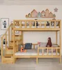A wooden bunk bed with a staircase and storage drawers, decorated with stuffed animals and wall art. Podgląd zdjęcia produktu