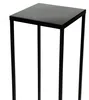 A close-up shot of a black, square-topped metal plant stand with three legs. Voir les images du produit