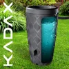 A rain barrel filled with water sits on a green lawn, with lush greenery in the background. Náhled obrázku produktu