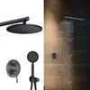 A collage showing a black shower system with a rain shower head, hand shower, and control panel. One part of the image shows the shower system components on a white background, and the other part shows the rain shower head in use in a shower. Náhled obrázku produktu