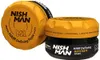 Two jars of Nishman M1 Matte Hair Defining Paste Argan are shown against a white background. One jar is slightly behind and to the left of the other. Anteprima dell’immagine prodotto