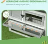 Close-up view of a two-tiered rabbit hutch with a removable tray, highlighting its cleaning feature. Podgląd zdjęcia produktu