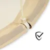 A close-up of the edge of a beige hammock swing with a rope and a plastic connector. A checkmark inside a shield icon is visible in the lower right corner. Produktbild-Vorschau