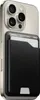A black leather card holder is attached to the back of a silver smartphone. Produktbild-Vorschau