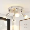 A ceiling light fixture with four adjustable spotlights is shown against a white ceiling. Produktbild-Vorschau