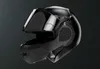 A black motorcycle helmet on a dark background. Náhľad obrázku produktu