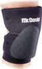 A black knee protector with a padded section and the brand name 'McDavid' printed on it. Anteprima dell’immagine prodotto