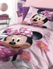 A close-up view of Minnie Mouse themed bedding, featuring two illustrations of Minnie Mouse and floral patterns. Náhled obrázku produktu