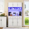 A white kitchen cabinet with LED lighting. Produktbild-Vorschau