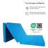 A blue foldable mattress is shown on a white background, with text and logos on the right side. Podgląd zdjęcia produktu