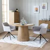 A dining set with two chairs and a table in a room. Voir les images du produit