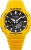 A close-up, front-facing studio shot of a yellow G-Shock watch. Náhled obrázku produktu