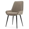 A single upholstered dining chair with dark beige velvet fabric and black legs, shown against a white background. Náhľad obrázku produktu
