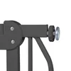 A close-up view of a dark gray metal safety gate's adjustable knob and mounting bracket. Náhled obrázku produktu