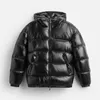 A black puffer jacket with a hood is displayed against a white background. Produktbild-Vorschau