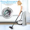 A woman is using a steam cleaner in a room. Anteprima dell’immagine prodotto