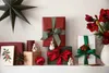 Christmas gifts and decorations arranged on a shelf. Podgląd zdjęcia produktu