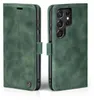 A green flip cover phone case for a Samsung Galaxy S22 Ultra is shown from two angles. Produktbild-Vorschau