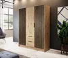 A modern bedroom or living room setting with a wardrobe, chair, and plant. Náhled obrázku produktu