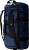 Side view of a blue duffel bag with black straps. Voir les images du produit
