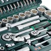 A close-up view of a tool kit, showing various sockets, a ratchet, and other accessories. Produktbild-Vorschau