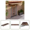 A collage of images showing a door awning installed on a house and different views of the awning itself. Náhled obrázku produktu