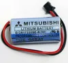 A close-up studio shot of a lithium battery with wires and a connector. Produktbild-Vorschau