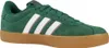 A side view of a green Adidas sneaker with white stripes and a brown sole. Produktbild-Vorschau