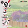 A wooden garden border with purple flowers in a garden setting. Produktbild-Vorschau