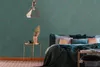 A bedroom setting with a bed, side table, and lamp. Produktbild-Vorschau