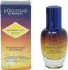 A product shot of L'Occitane Immortelle Reset Overnight Oil-In-Serum and its packaging, presented against a white background. Náhled obrázku produktu
