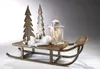 A decorative wooden sled with Christmas-themed accessories. Podgląd zdjęcia produktu