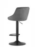 A gray velvet bar stool with a black base and adjustable height mechanism, shown from the side against a white background. Produktbild-Vorschau