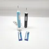 Two electric toothbrushes and replacement brush heads are displayed on a white background. Anteprima dell’immagine prodotto