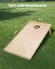 A wooden cornhole board is placed on grass. Náhled obrázku produktu