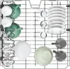 A dishwasher rack filled with various dishes, bowls, and cups. Voir les images du produit