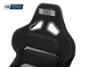 Close-up of a black racing seat with white stitching and grey accents. Podgląd zdjęcia produktu