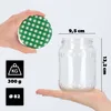 A hand holding a green checkered lid, and another hand holding a glass jar with dimensions indicated. Anteprima dell’immagine prodotto