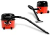 A collage of a red and black Henry vacuum cleaner with its hose and nozzle. Produktbild-Vorschau