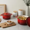 A kitchen scene with cookware and food. Anteprima dell’immagine prodotto