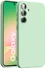 A light green silicone phone case is shown next to a smartphone with the word 'Galaxy' on its screen. Náhled obrázku produktu