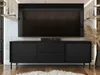 A black TV stand with a large television mounted above it, in a modern living room setting. Náhled obrázku produktu