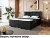 A bedroom scene featuring a black upholstered bed with a white mattress and topper, a large potted plant, and a side table. Produktbild-Vorschau