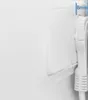 A close-up view of a white electrical outlet with a white power strip plugged into it. A measurement indicator shows 8mm. Produktbild-Vorschau