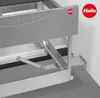 A close-up view of a kitchen waste bin mechanism, likely a pull-out system, with the Hailo logo visible. Produktbild-Vorschau