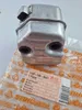 A STIHL muffler is shown on top of its packaging. Produktbild-Vorschau