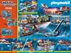 A collage of images showing a Playmobil rescue boat set in action, with various smaller images depicting different components and play scenarios. Produktbild-Vorschau