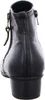 The back view of a black leather boot. Anteprima dell’immagine prodotto
